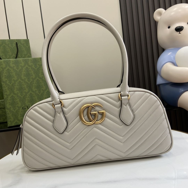 G*u*i top handle bags
